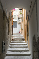 Narrow street in Cefalù, Italy