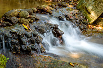 Fototapeta na wymiar Kathu Waterfall on Phuket island in Thailand