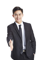 asian businessman reaching out for handshake, islolated on white background. 