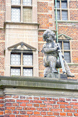 Obraz premium Statue of angel, detail of Rosenborg Palace, exterior decorative element, Copenhagen, Denmark