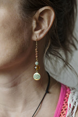 Beautiful earrings with lotus and ethno beads