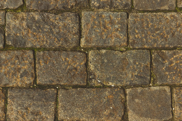 Brown ancient paving stones, vintage stone background, texture