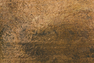Wet stone. brown stone texture. Natural vintage stone background. Stone surface - sandstone, limestone