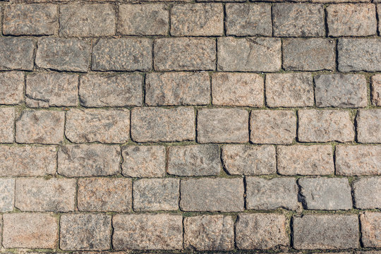 Brown ancient paving stones, vintage stone background, texture