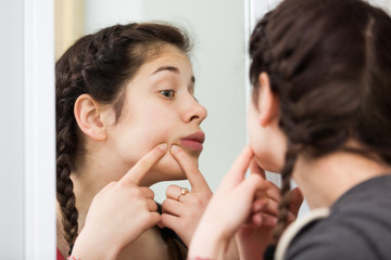 Girl cleaning pores