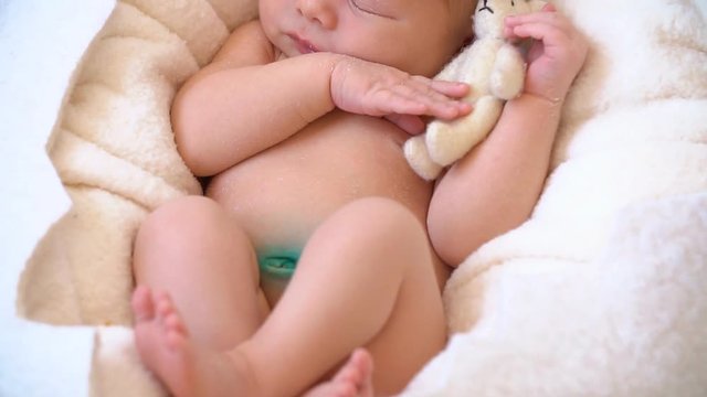 Little Newborn Baby Sleeping. Slow motion.