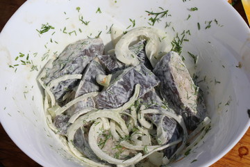 Steaks of catfish, fish, slices of fish, skewers of catfish, seafood, food, fresh fish, river fish, delicious, useful, lunch, lunch, dinner, steaks of fish in mayonnaise, onion, white,