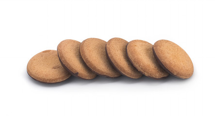 Fototapeta na wymiar A single hazelnut filled nougat chocolate chip cookie on a white background