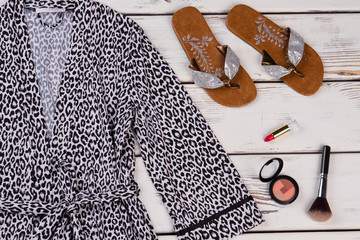 Fototapeta premium Home bathrobe, flip flops, cosmetics.