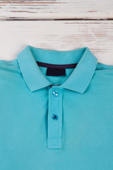 Blue men t-shirt close up.