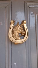 Horseshoe door knocker
