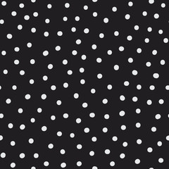 Randomly placed dots and spots seamless vector pattern. Hand drawn decorative background or simple texture for print, textile, wallpaper, home decor, wrapping or web.