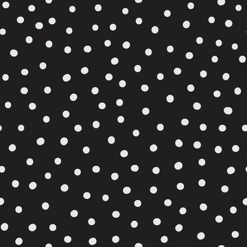 Randomly placed dots and spots seamless vector pattern. Hand drawn decorative background or simple texture for print, textile, wallpaper, home decor, wrapping or web.