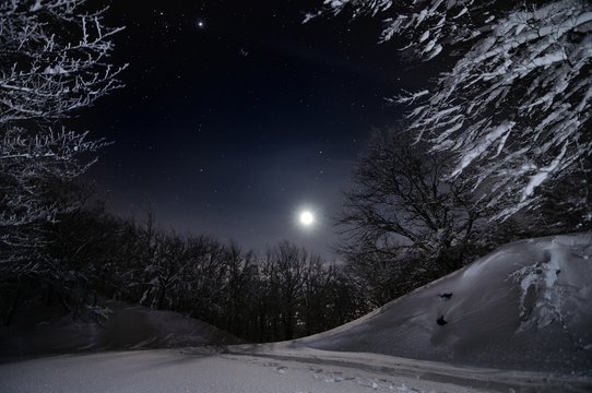 Winter's landscape in the night of tuscany's hills. Pian della Rasa, Cantagallo, Toscana, Italia