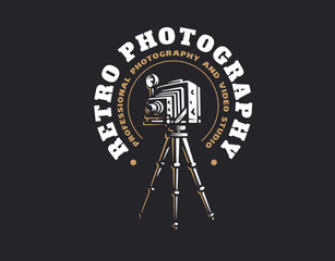 Retro photo camera logo - vector illustration. Vintage emblem design