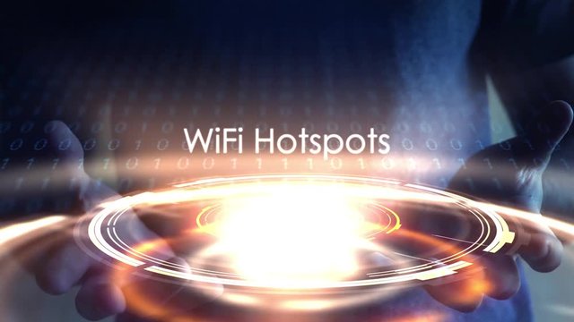 Technology concept - Glowing Aura of Wifi Hotspot in mans hand