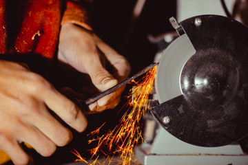 sharpening the cutter on the machine