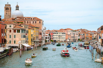 Obraz na płótnie Canvas Venice, Italy - July, 28, 2017: boat traffic on the Channel in Venice, Italy