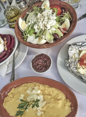 Fototapeta na wymiar Traditional greek salad appetizers on table