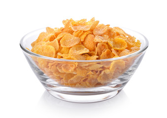 corn flakes in a bowl on white background