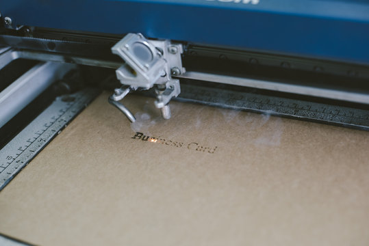 Laser engraving business card from recycled cardboard