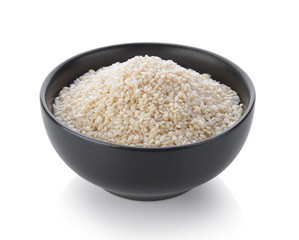 Sesame in a bowl on white background