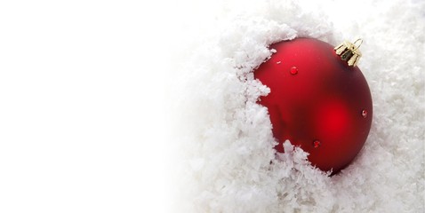 Red christmas balls and chef hat on white background