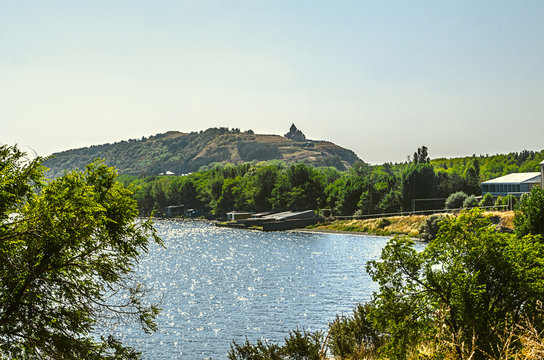 Peninsula with views of the Church of the Holy Apostles on of the аlpine lake Sevan in Armenia 
