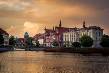 Fototapeta premium Old buildings and Odra river at sunrise in Wroclaw, Poland