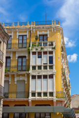 old Facade with glazed balconies