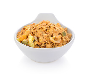 muesli in bowl on white background