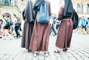 nun feet in crowd