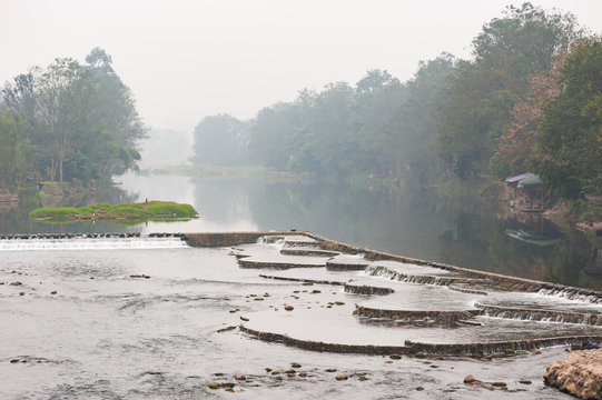 Foggy Landscape With A Dam On A River, Pingle, China