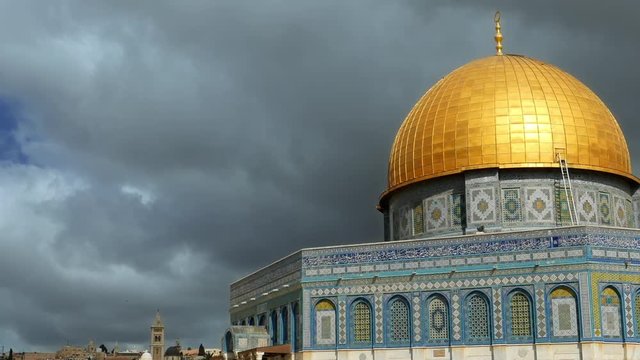 Clouds over Dome of the Rock in Jerusalem over the Temple Mount. Golden Dome is the most known mosque and landmark in Jerusalem and sacred place for all muslims.