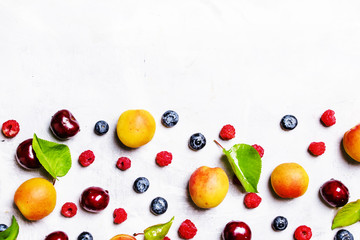 Food background, summer berries and fruits, top view