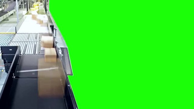 Parcels on conveyors - time lapse with green screen