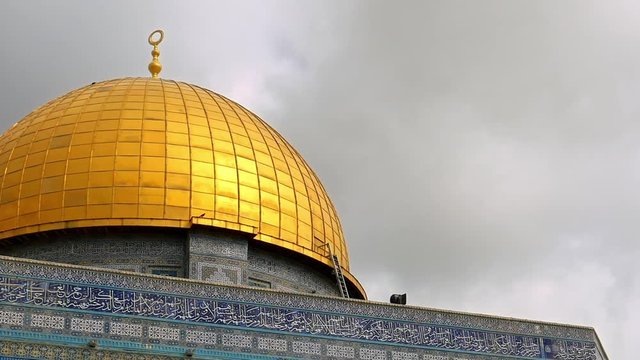 Clouds over Dome of the Rock in Jerusalem over the Temple Mount. Golden Dome is the most known mosque and landmark in Jerusalem and sacred place for all muslims.