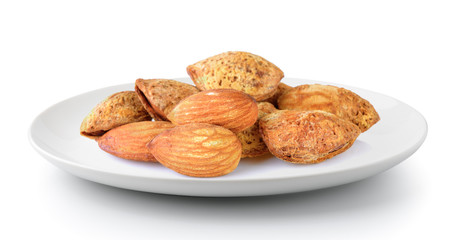 almonds in a plate isolated on a white background