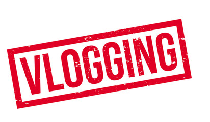 Fototapeta premium Vlogging rubber stamp. Grunge design with dust scratches. Effects can be easily removed for a clean, crisp look. Color is easily changed.