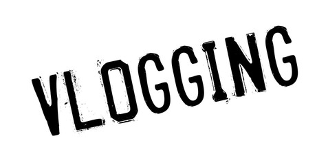 Vlogging rubber stamp. Grunge design with dust scratches. Effects can be easily removed for a clean, crisp look. Color is easily changed.