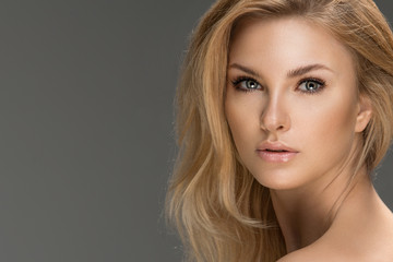Fototapeta premium Glamour portrait of beautiful woman model. Summer glow on skin