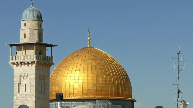 Golden Dome of the Rock and Western Wall in Jerusalem zoom out shot. Dome of the Rock is located on the top of the Temple Mount in Jerusalem, Israel.