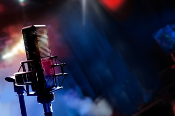 Microphone on stage during concert, blurred background