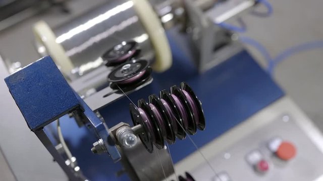 Cable production. Part of production equipment.
Raw material feed (a steel wire on the coil).
