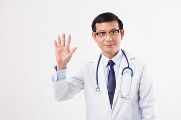 Fototapeta premium confident asian male doctor pointing up 5 fingers
