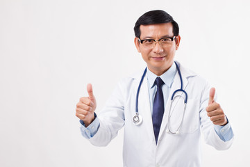asian doctor showing two thumbs up gesture, yes, good, approval concept