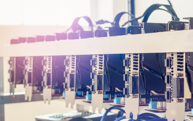 Cryptocurrency background (mining rig), Close up of array of GPUs for mining rig machine to mine...