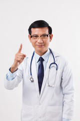 confident doctor pointing up, suggesting something