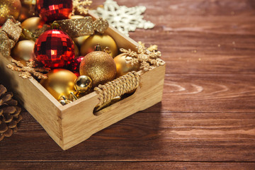 box with christmas white gold red toys balls and stars new year background decorations