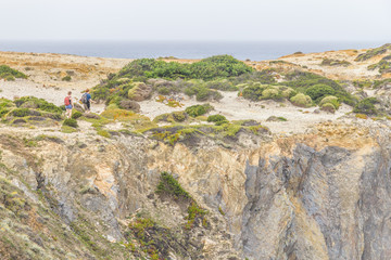 Trekking over cliffs in Zambujeira do Mar